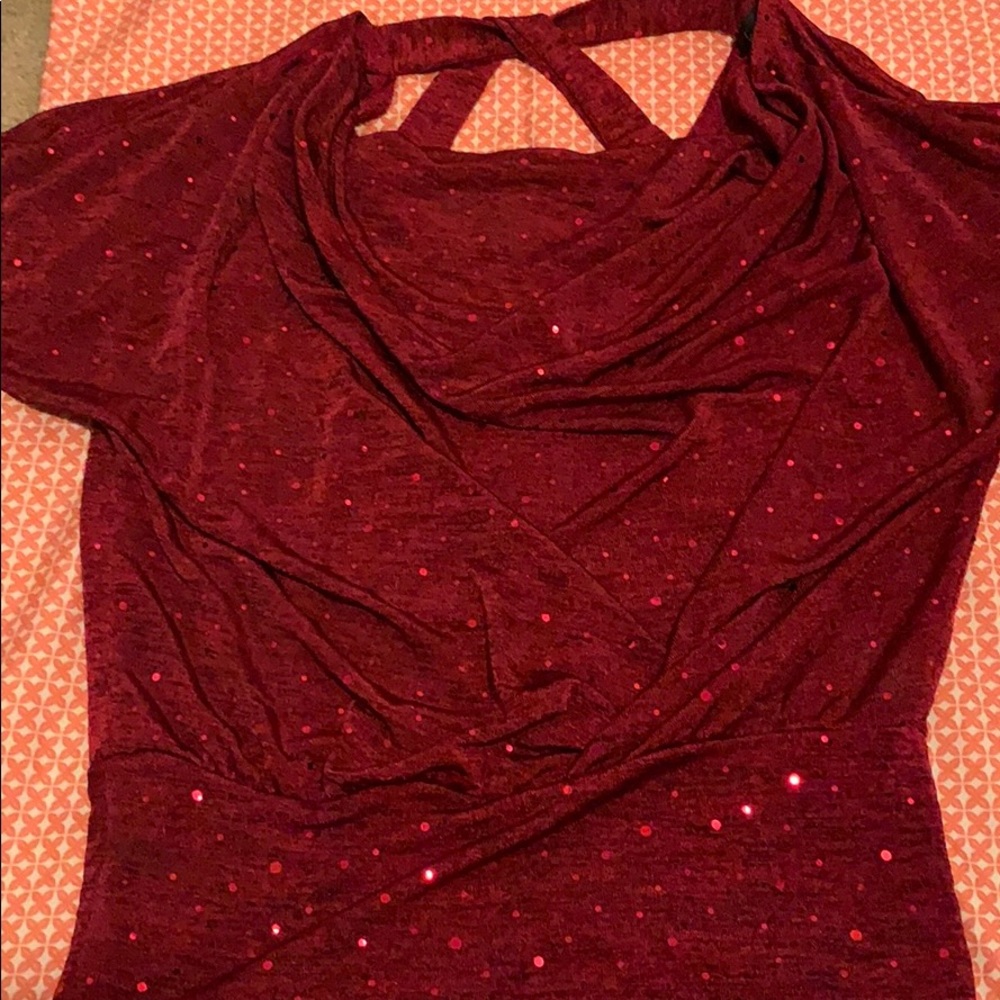I am selling this cute reddish shirt